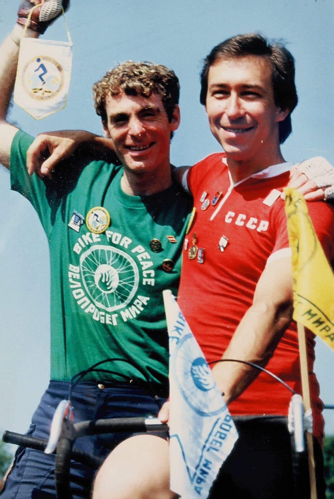 American and Soviet cyclists sharing a tandem